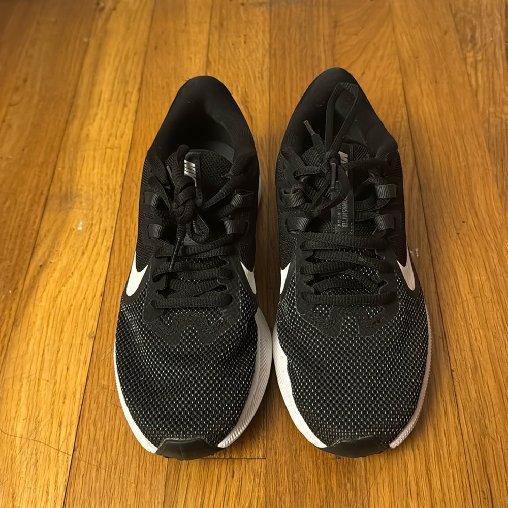 Black Nike running shoes